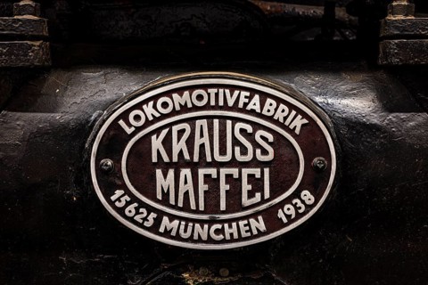 Name plate of the former locomotive factory, Kraus Maffei from Munich on a historic locomotive with