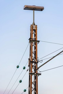 Power pole with lamp, Augsburg railway park, administrative district of Swabia, Bavaria, Germany