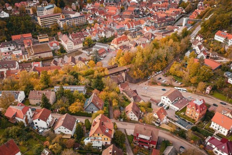 The picture shows the structure of a medieval town surrounded by autumn nature, Calw, Black Forest,