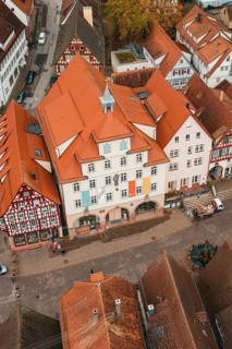 Historic half-timbered houses in an old town with red roofs and an autumn atmosphere, Calw, Black
