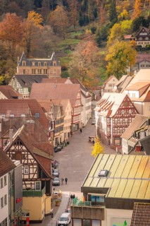 Narrow streets and half-timbered houses in an old town surrounded by autumnal nature, Calw, Black