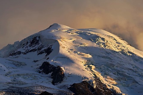 Snow-covered Dome du Goûter, in the evening light, Chamonix-Mont-Blanc, Haute-Savoie, France