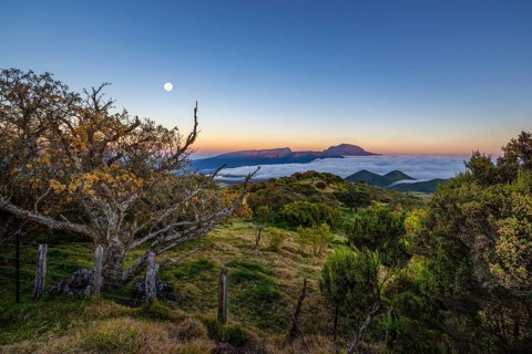 View of Piton de Neige mountain, La Reunion, vast landscape with mountains in the background, the