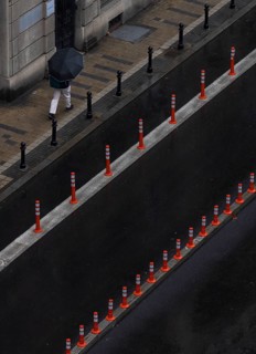 Man with umbrella walking on a street, from above, street scene, Belgrade, Serbia