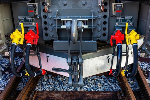 Yellow and red levers for main air lines on a modern railway locomotive, Augsburg railway park,