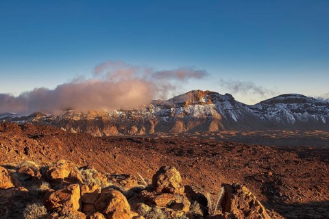 Wide mountain landscape with clouds and rugged rocks under a clear sky, UNESCO World Heritage Site,
