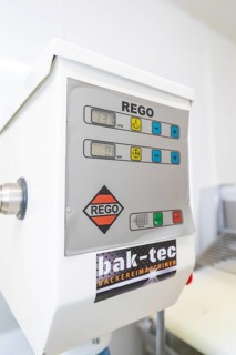 Close-up of a rego bakery machine with various control buttons in a bakery, Weihnachtsbacken,