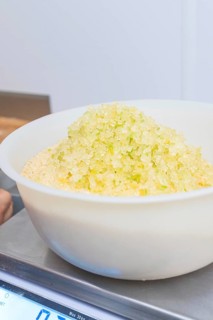 Close-up of a bowl of yellow sugar on a scale in a kitchen, Christmas baking, Haselstaller Hof,