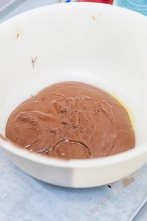 A white bowl of melted chocolate in the kitchen, Christmas baking, Haselstaller Hof, Wildberg,