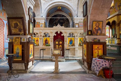 Interior of a church with altar and icons, richly decorated and religious atmosphere, Motsameta