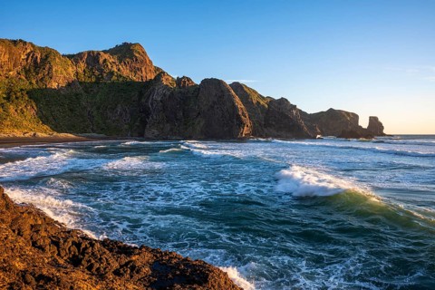Landscape in New Zealand with sea and beach. Wigmore Bay near Bethell's Beach (Te Henga) . In the