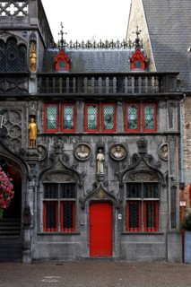 Richly decorated façade of the criminal office at the St. Ivo Chapel of the Holy Blood Basilica,