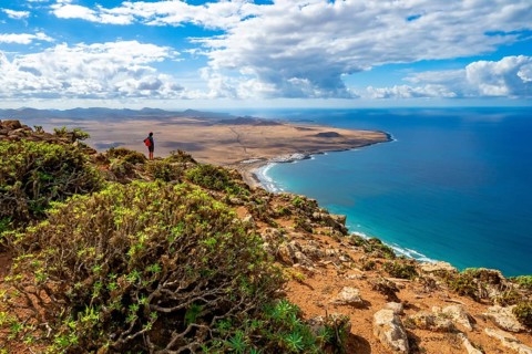 View from the Castillejo viewpoint from the Risco de Famara cliffs to the coast and the sea with
