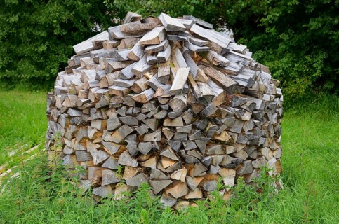 Stack of firewood in Den gamle by, The old village, open air museum in Odense, Fyn island, Fuen,