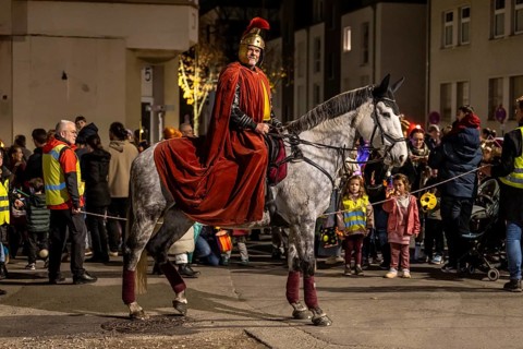 Martinszug in Essen-Rüttenscheid, the parish of St. Lambertus, Saint Martin actor on a horse, with