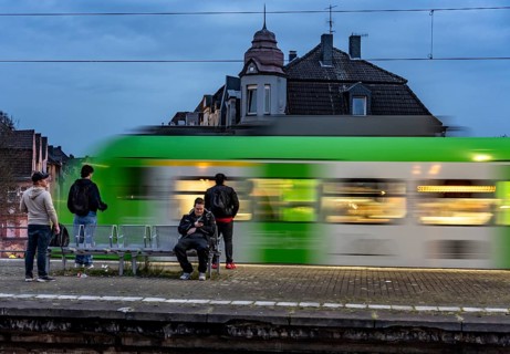 Essen-Steele S-Bahn station, passengers waiting for the train late afternoon, in autumn, Essen,