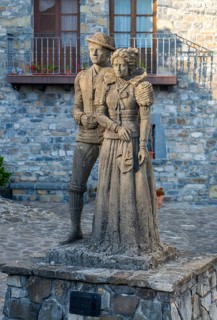 Traditional Cheso Costume statue sculpture, Echo or Hecho, Valle de Hecho, Huesca province, Aragon,