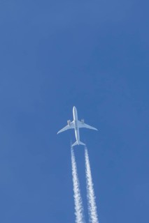 Boeing 787-9 Dreamliner jet passenger aircraft of Gulf Air airlines flying in a blue sky with