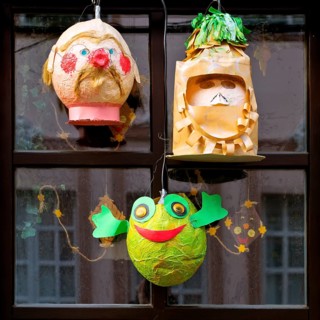 Homemade lanterns for the Martin train in front of a window, Old Town, Kempen, Lower Rhine, North