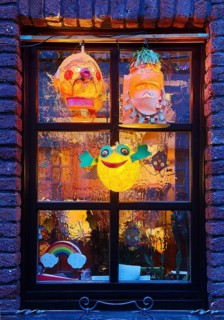 Homemade lanterns for the Martin procession in front of a window in the evening, Old Town, Kempen,