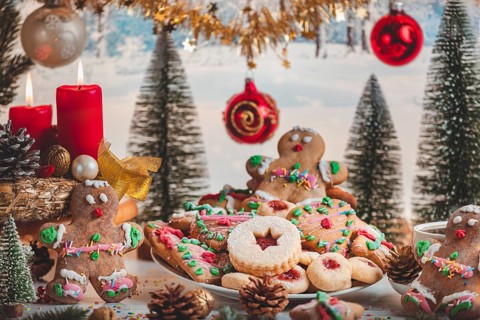 Festively decorated Christmas table with cookies and decorations