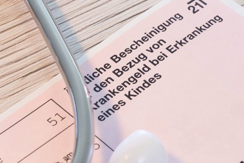 Close-up of a medical certificate for receiving sickness benefit if the child is ill