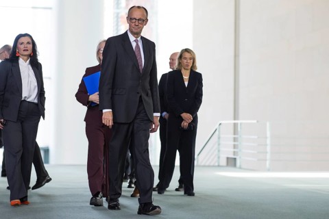 Friedrich Merz (Federal Chancellor of the Federal Republic of Germany, CDU) handing over the annual