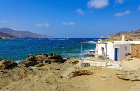 Mykonos, Cyclades, Greece - Ftelia Beach, fishing lodge on Ftelia beach, sandy beach on windy rocky