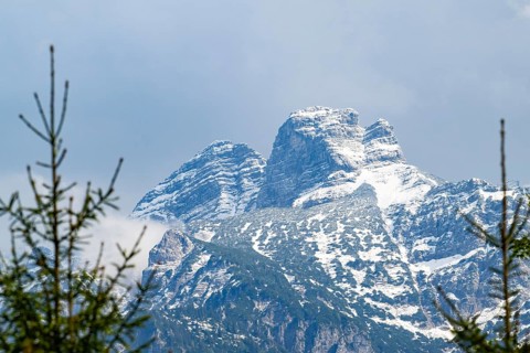 View into the mountains next to Lake Almsee on a rainy day in spring, Traunstein summit,