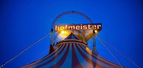 Circus, circus tent, logo behind furniture store Hofmeister, blue hour, Sindelfingen,