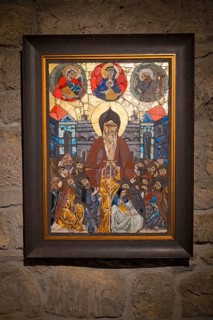 Colorful mosaic painting of religious figures on stone wall, mosaic style icon, Tatev monastery,