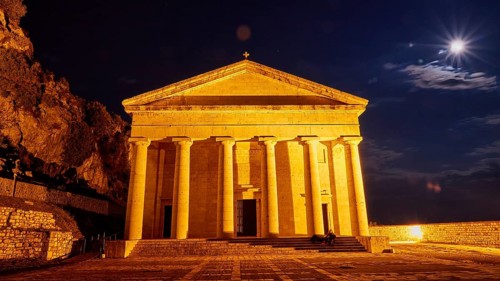 Historic temple at night with lighting and full moon in the sky, UNESCO World Heritage Site, Old