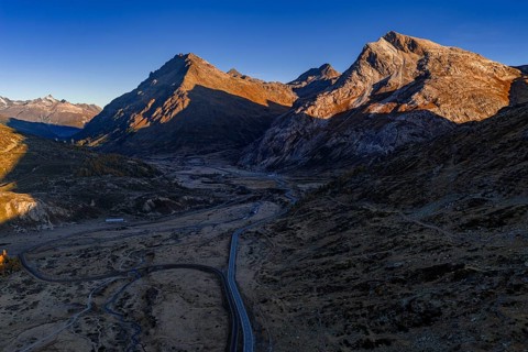 Mountain landscape, autumn, morning light, aerial view, road, Bernina Pass, Engadin, Switzerland