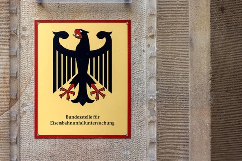 Sign from the Federal Office for Iron Accident Investigation with the National Emblem of the