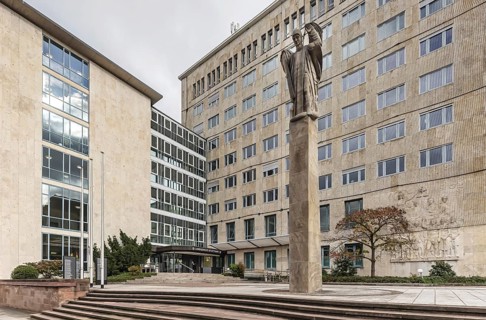 Stuttgart Regional Court. Court building with sculpture Constitutional Column and memorial for