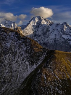Steep mountains, snowy, mountain range, sunny, wild, autumn, aerial view, Pordoi Pass, view of