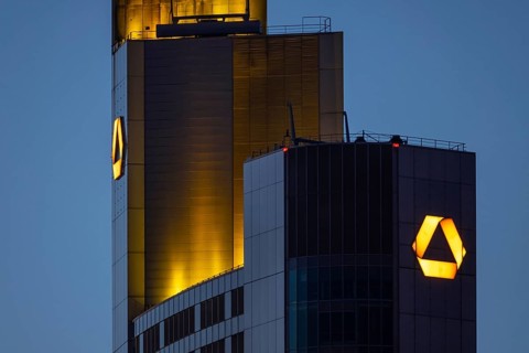 The top of the Commerzbank Tower in Fankfurt am Main glows in the evening, Frankfurt am Main,