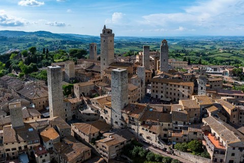 City view of San Gimignano, gender towers and medieval buildings, Tuscany, Italy