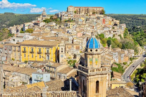 Elevated view of the church of Santa Maria dell'Itria and Ragusa Ibla in the distance, Ragusa Ibla,