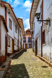 Alleyway with historical buildings in colonial style in the city of Ouro Preto, Minas Gerais, Ouro