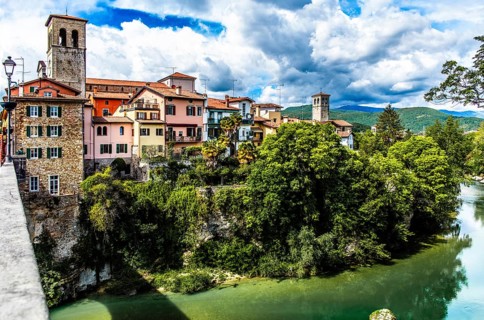 Ponte del Diavolo from the 15th century leads across the Natisone river to the old town, Devil's