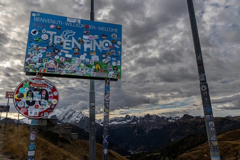 Sign, road sign, sticker, soccer fans, Sella Pass, Dolomites, Italy