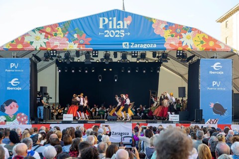 Folk dancers performing on stage as part of Pilar 2025 festival event, Zaragoza, Aragon, Spain