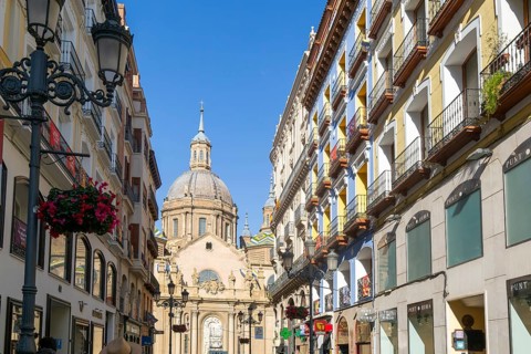 View of Basilica of Our Lady of the Pillar cathedral church from Calle de Alfonso I, Zaragoza,