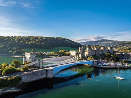 Conwy Castle over River Convy from a drone, Convy, North Wales, England, United Kingdom