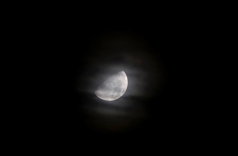 Moon at night behind veil clouds, autumn, Germany