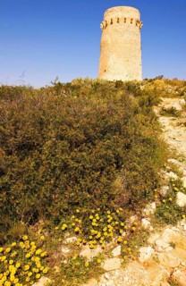 Nature reserve, national park, old watchtower Torre del Cap d'Or, Moraira, on Playa del Portet,