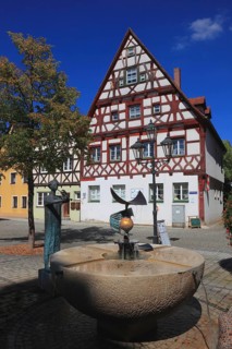 Half-timbered houses and fountains on Rathausplatz, city of Heideck in the district of Roth, Middle