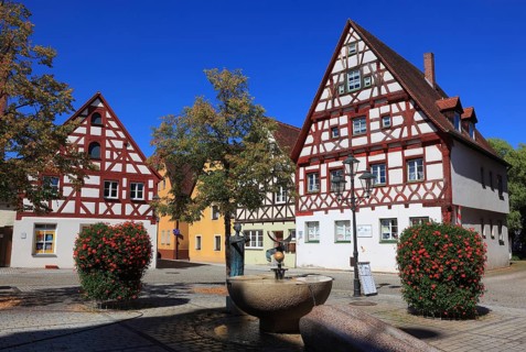 Half-timbered houses and fountains on Rathausplatz, city of Heideck in the district of Roth, Middle