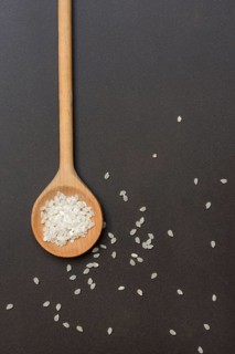 Rice grains in cooking spoons, rice